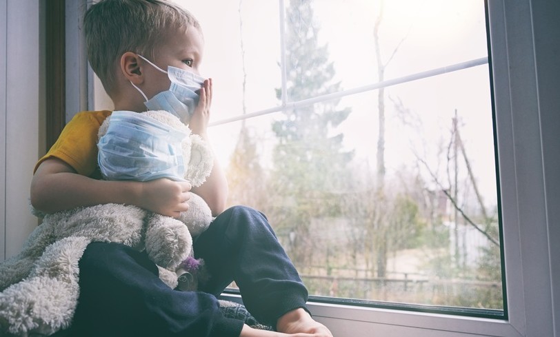 LC Child looking out a window